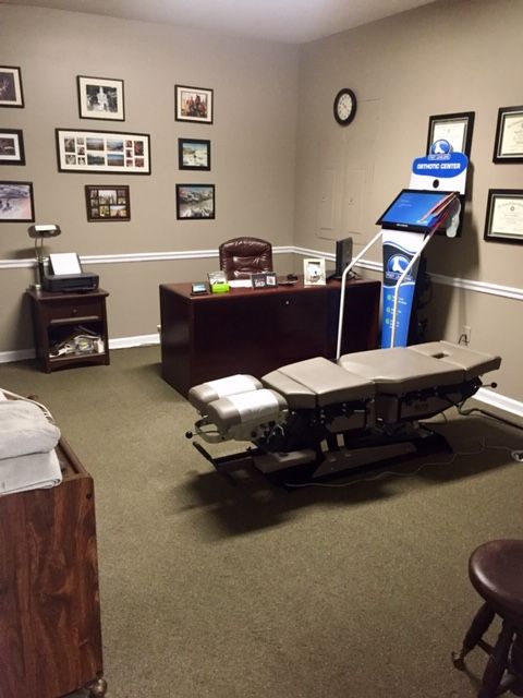 Doctor's office with adjustment table and Orthotic Center scanner