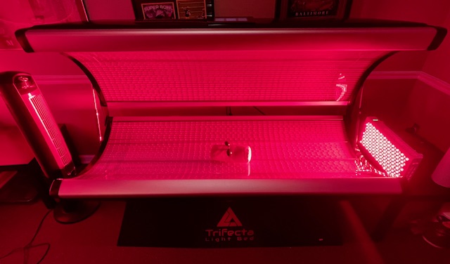 Trifecta red light therapy bed in use